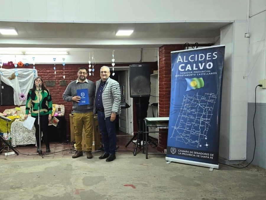 Milanesio y Calvo en el segmento protocolar de la fiesta.