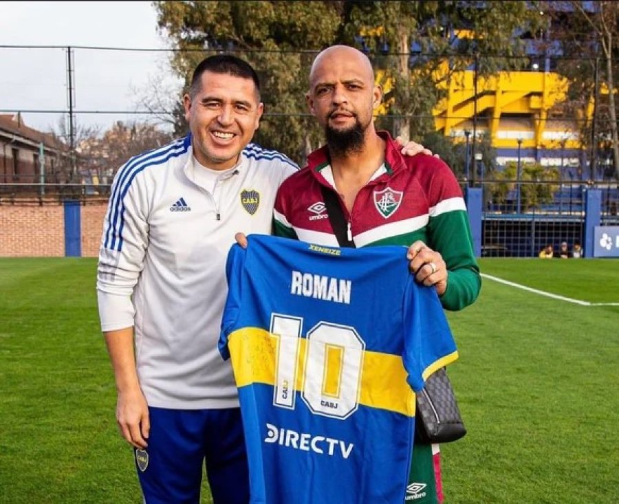 Felipe Melo junto a Juan Rom&aacute;n Riquelme.